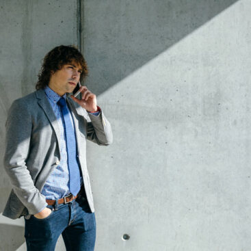 businessman-talking-on-the-cell-phone-outside